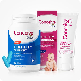 Conceive Plus Men's Fertility Support and Fertility Lubricant Bundle showing a 60-capsule blue bottle of Men's fertility support supplements and two loose capsules, a box of 30ml fertility lubricant support with baby image, and a 30ml fertility lubricant tube—all upright and front-facing against a white background.