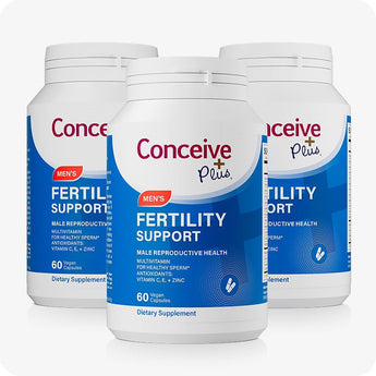 For Conceive Plus Men's Fertility Support and Fertility Lubricant Bundle, featuring three bottles of Men's Fertility Support supplement, each with blue label and 60 vegan capsules, arranged in a triangular layout on a white background.